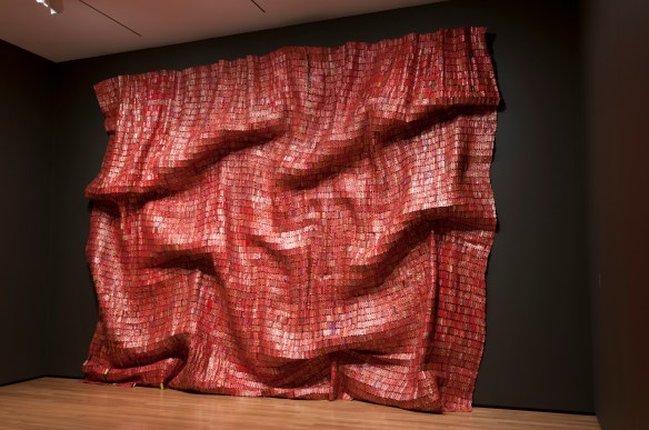 El Anatsui (Ghanaian, born 1944). Red Block, 2010. Aluminum and copper wire, Two pieces, each measuring 200 3/4 x 131 1/2 in. (509.9 x 334 cm). Courtesy of the artist and Jack Shainman Gallery, NY. Photograph by Andrew McAllister